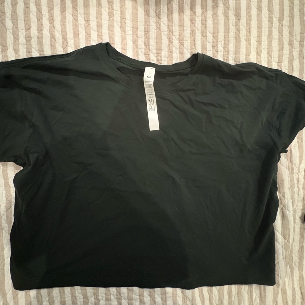 Brand new never worn Cates t shirt